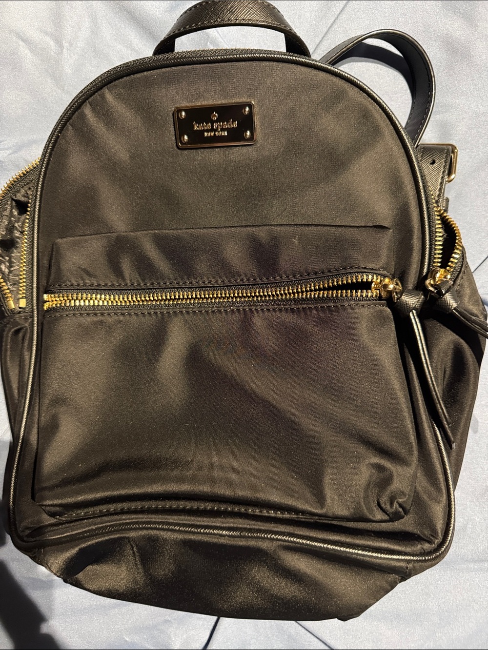 kate spade black nylon backpack with gold hardware